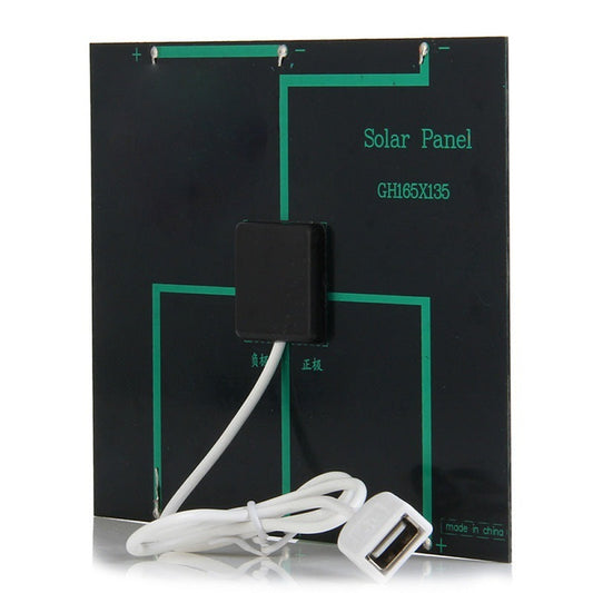 Close-up of Solar Power Bank Charger 4 in 1 charging dock station showing USB connector and labeled solar panel circuitry.