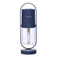 Dark blue USB Mini Humidifier with transparent water tank and vertical stand, ideal for compact home or office climate control.