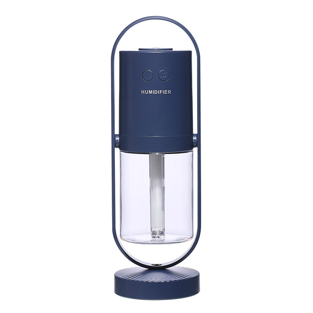 Dark blue USB Mini Humidifier with transparent water tank and vertical stand, ideal for compact home or office climate control.
